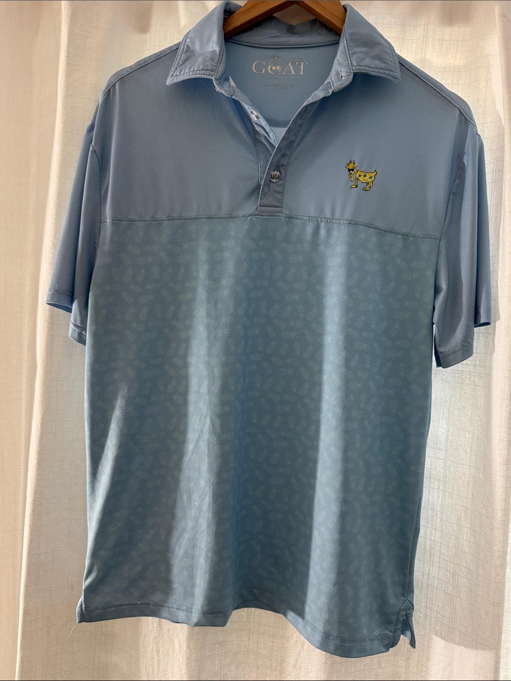 GOAT Men's Light Blue Short-Sleeve Polo with Embroidered Logo